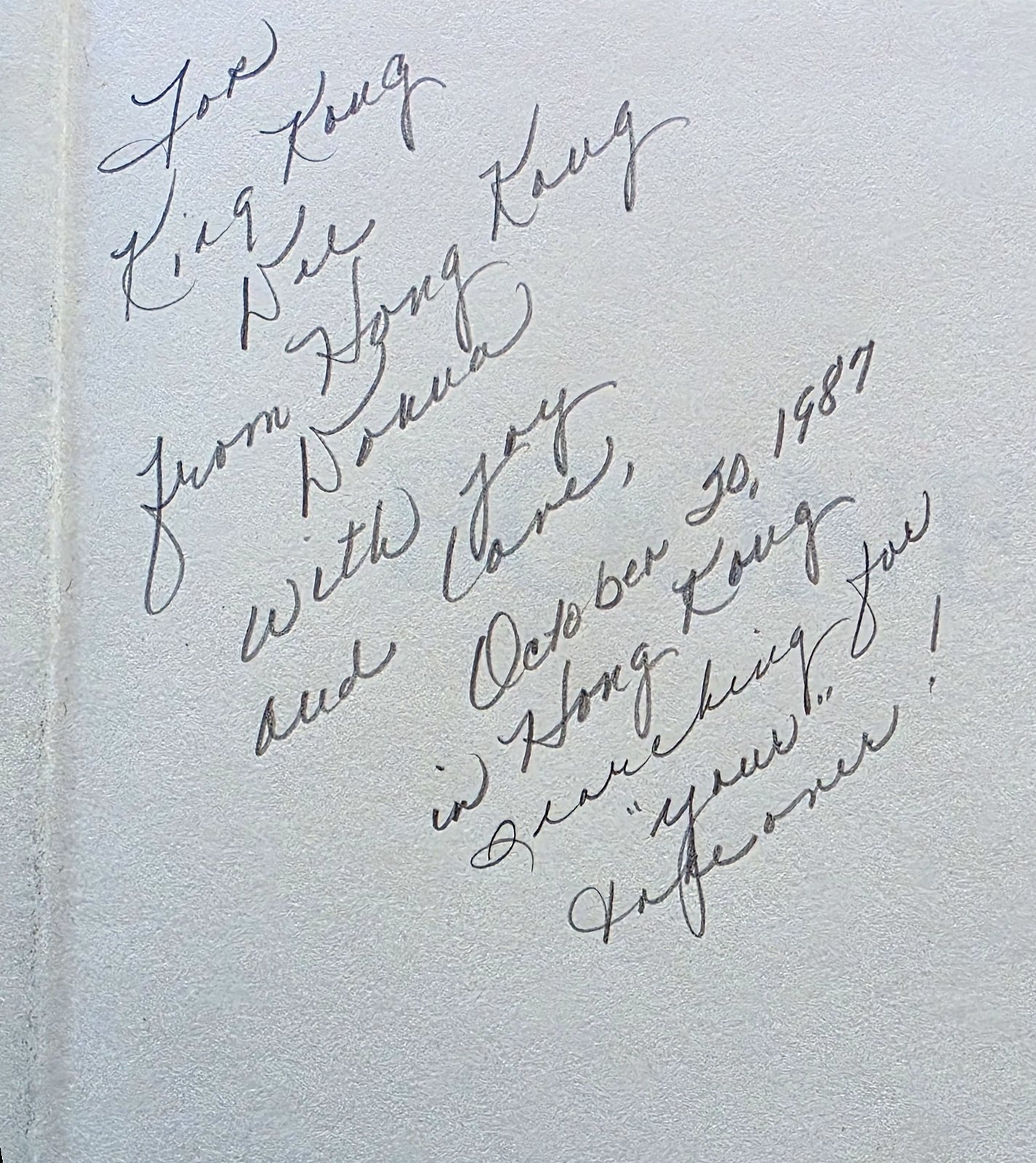 Flyleaf with a slanting handwritten inscription For King Kong Del from Hong Kong Donna, dated October 30, 1987, in Hong Kong
