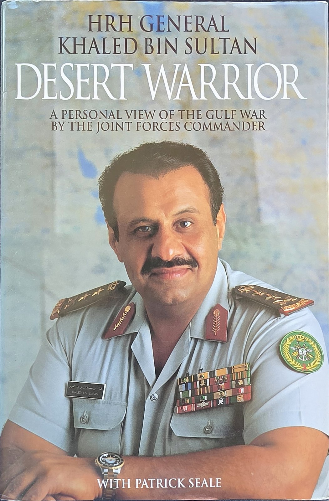 Cover of Desert Warrior: A Personal View of the Gulf War by the Joint Forces Commander, by HRH General Khaled bin Sultan with Patrick Seale, with his portrait in uniform