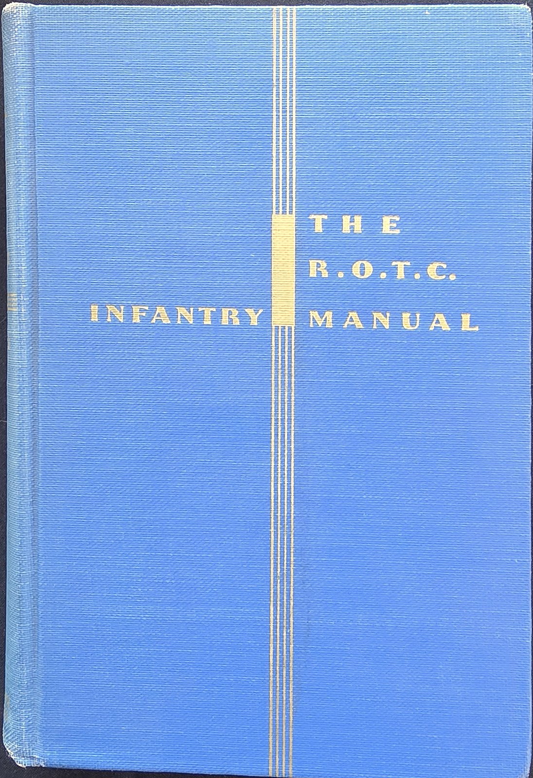 Blue clothbound cover with gold stripes, printed The R.O.T.C. Infantry Manual