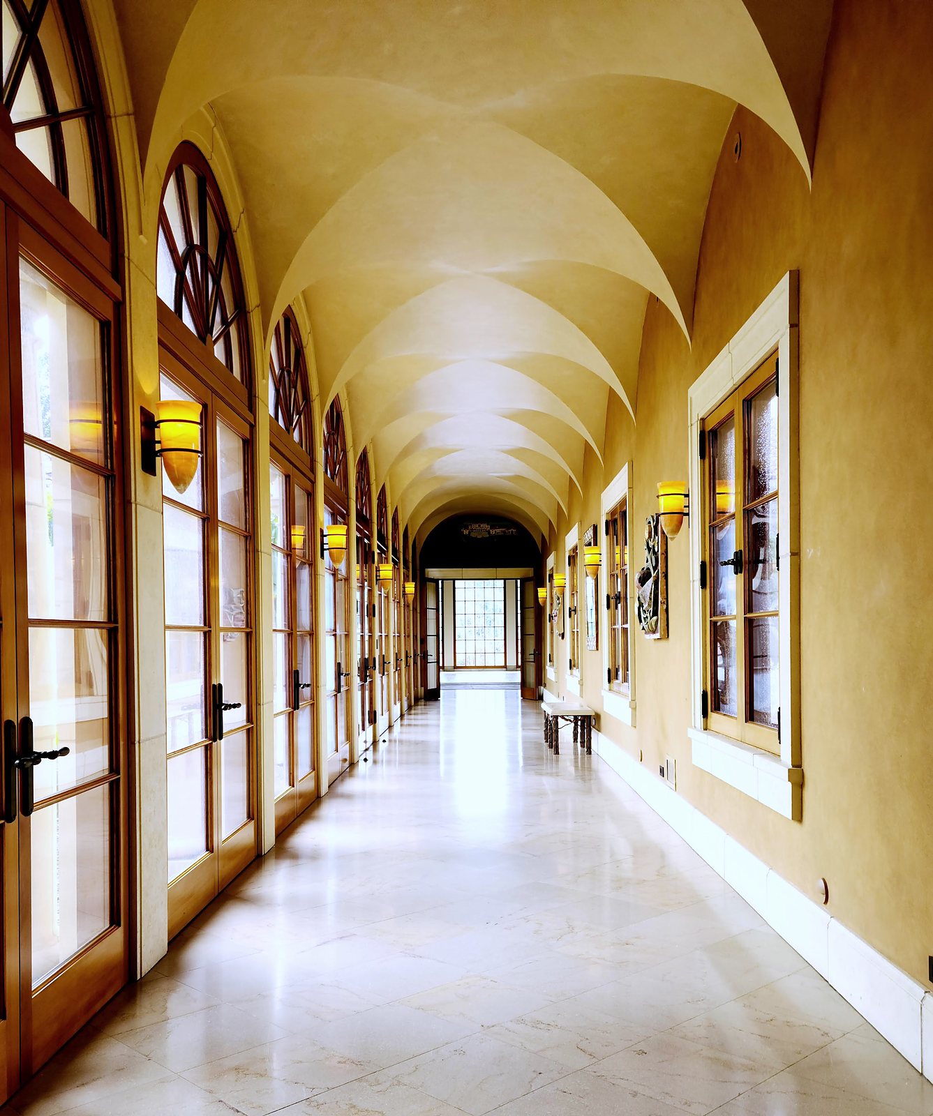 Long arched gallery with polished floor